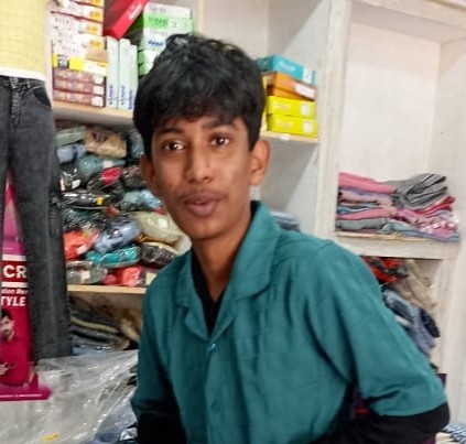 Ajay posing in baggy pants